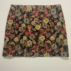 Navy blue skirt with gold and pink floral details